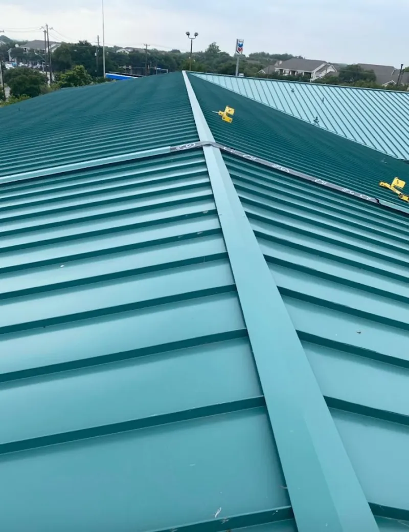 Green commercial metal roof ridge and valley for Metal Roof Repair in Rendon
